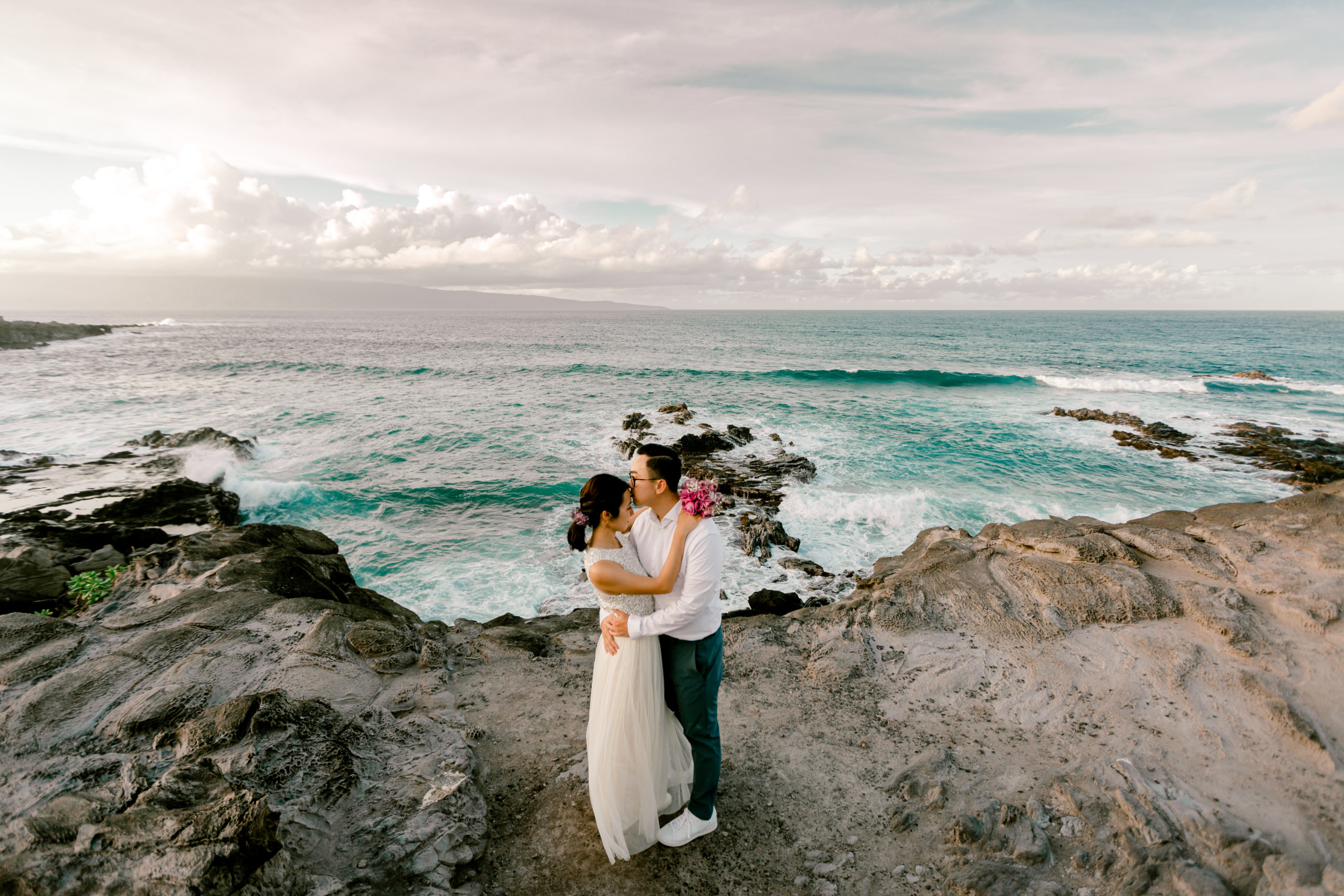 Jenny Vargas Photography Team Associate Amber photographs the Newlywed Couple's Photography Session at Honolua Forest and Ironwoods Beach