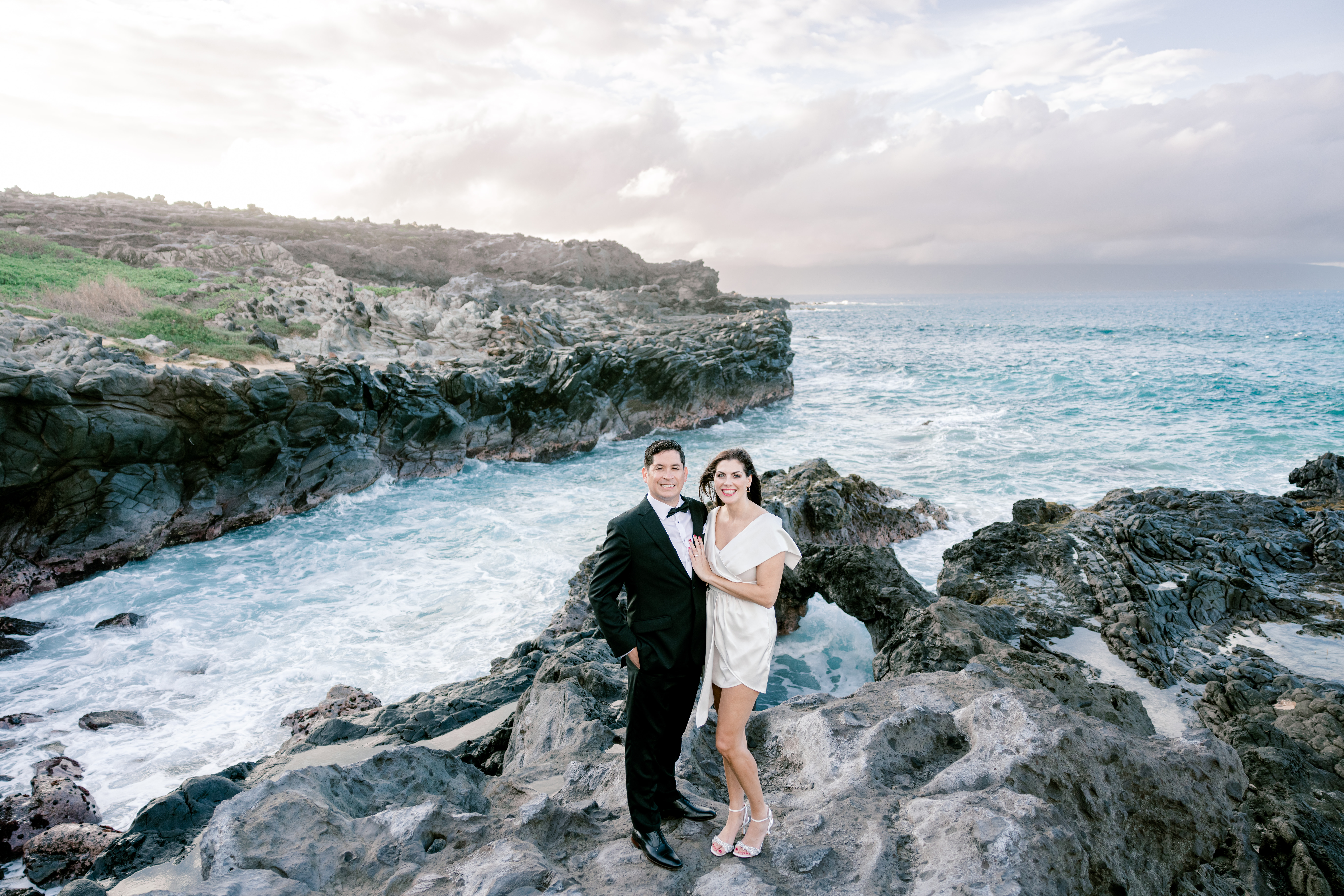 Maui Honeymooner's Couple standing side by side at their Photography session at Ironwoods Beach in Kapalua, HI.