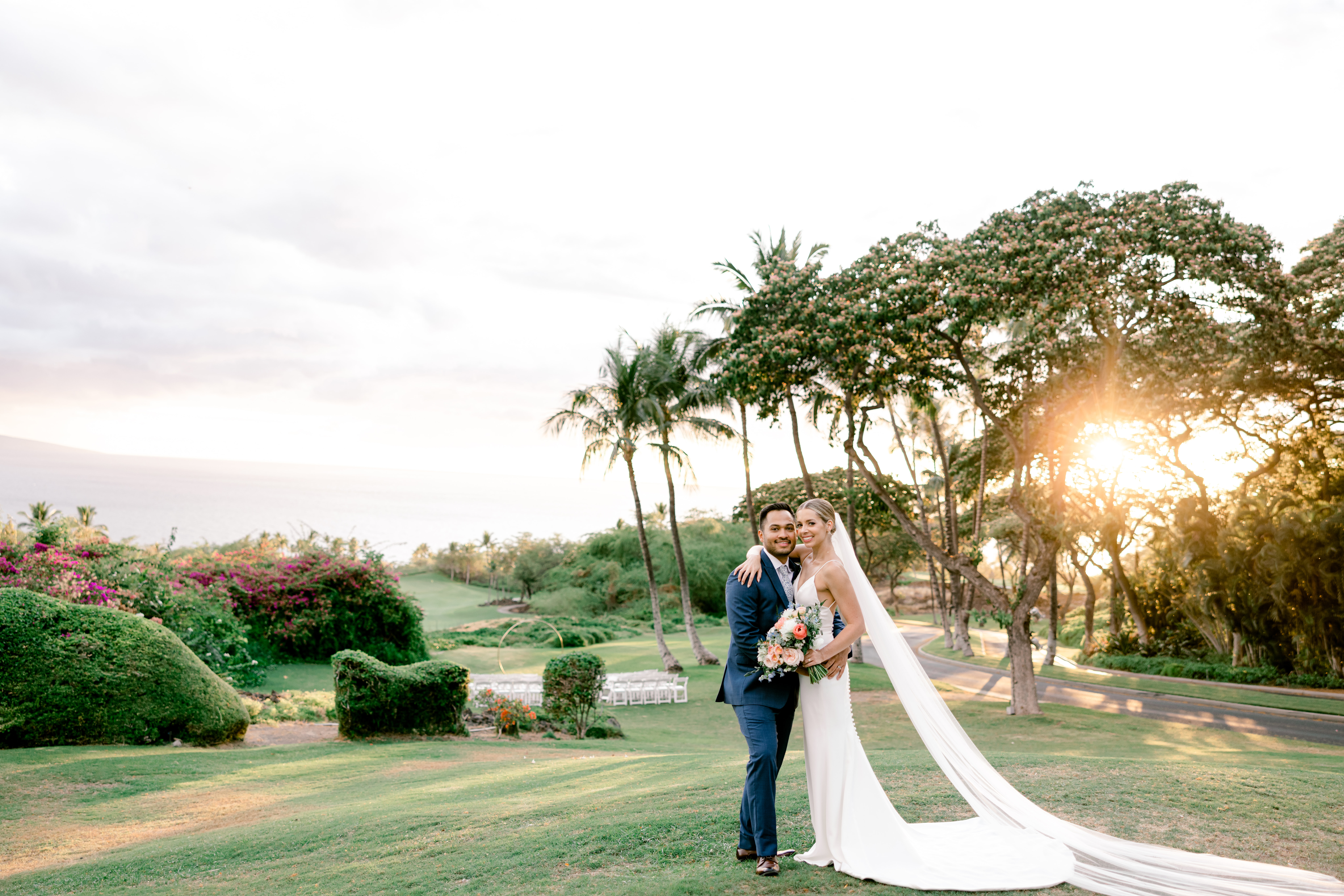 Man and woman hugging for their wedding portraits taken at Gather in Maui Wedding location in Wailea